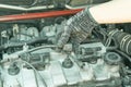 Remove connector from ignition coil and checking spark plug, Auto mechanic maintenance ignition system Royalty Free Stock Photo
