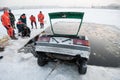 Removing the car out of the ice-hole