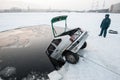 Removing the car out of the ice-hole