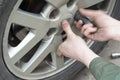 Removing Car Wheel Nut Royalty Free Stock Photo