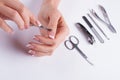 Removing cuticle. Manicure set. Royalty Free Stock Photo