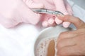 Removing cuticle from the nail