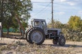 Removing fallen tree with tractor and loader Royalty Free Stock Photo