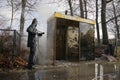 Removing graffiti from bus stop