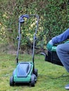 Removing grass basket from a electric lawn mower machine