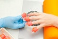 Removing manicure with acetone Royalty Free Stock Photo
