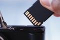 Removing memory card from a digital camera for data transfer