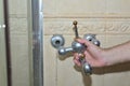 Removing old bathroom tap Royalty Free Stock Photo