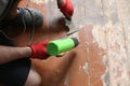 Removing paint from an old wooden floor. Repair process Royalty Free Stock Photo