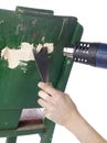 Removing paint using a heat gun