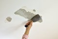 Removing Plaster with a Spatula Royalty Free Stock Photo