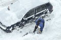 Removing snow from the cars