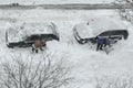 Removing snow from the cars