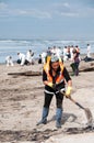 Rena oil spill clean up workers Royalty Free Stock Photo