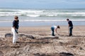 Rena oil spill clean up workers Royalty Free Stock Photo