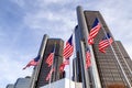 The Renaissance Center RenCen skyscrapers surrounded by American Flags in Downtown Detroit, Michigan, USA Royalty Free Stock Photo