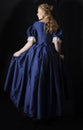 Renaissance century woman in a blue silk gown