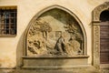 Renaissance Church of the Nativity Virgin Mary, historic center in medieval town, ancient stone portal, stone bas-relief Christ