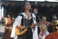 Musicians dressed in Medieval costumes at a renaissance faire Royalty Free Stock Photo