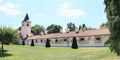 Renaissance outbuildings with Virgin Mary`s Church on palace Kratochvile