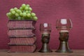 Renaissance, rummer wine glass, old books and grapes