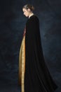 A Renaissance, Tudor, Georgian, or high fantasy woman in a historical or fantasy costume