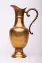 Renaissance wine brass carafe on the white background