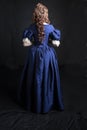 Renaissance woman in blue silk dress