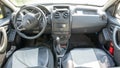 Renault Duster salon. Interior design, dashboard, speedometer, tachometer and steering wheel inside the car. The car is produced