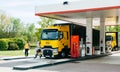 Renault T520 Yellow Truck Formula 1 Team gas station Royalty Free Stock Photo