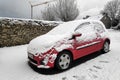 Renault Twingo II phase one totally covered by snow Royalty Free Stock Photo