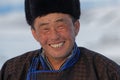 Portrait of a smiling mongolian nomad farmer