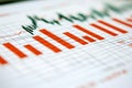 Rendering of declining bar and line charts on a grid background. Royalty Free Stock Photo