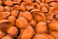 Rendering endless pile of orange plastic work helmet`s.