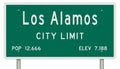 Los Alamos road sign showing population and elevation