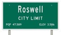 Roswell road sign showing population and elevation