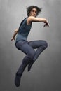 CG handsome urban fantasy man leaping into the air