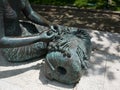 A Rendilheira de Vila do Conde bronze statue to lace weaver, close up detail.