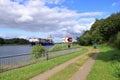 Rendsburg, Germany - August 22 2025: cargo ship pass beneath the Rendsburg High Bridge on the Kiel Canal Royalty Free Stock Photo
