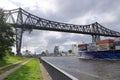 Rendsburg, Germany - August 22 2025: cargo ship pass beneath the Rendsburg High Bridge on the Kiel Canal Royalty Free Stock Photo