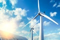 Renewable energy background with green energy as wind turbines and solar panels. Generative Ai Royalty Free Stock Photo