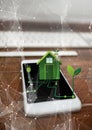renewable energy house on phone Royalty Free Stock Photo