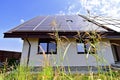 Renewable energy house with photovoltaic roof Royalty Free Stock Photo