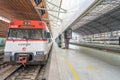 RENFE locomotive carriage stopped at the Abando Idalecio Prieto railway station.