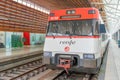 RENFE locomotive carriage stopped at the Abando Idalecio Prieto railway station.