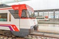 RENFE locomotive carriage stopped at the Abando Idalecio Prieto railway station.