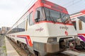 RENFE locomotive carriage stopped at the Abando Idalecio Prieto railway station.