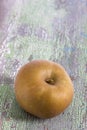 Rennet apples is a very old variety with a pleasant mild dry flavour old green painted wooden board