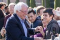 RENO, NV - October 25, 2018 - Bernie Sanders smiling while meeting with attendees in crowd at a political rally on the UNR campus.