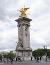 Renommee de l`Industrie- golden statue on the Pont Alexandre II Royalty Free Stock Photo